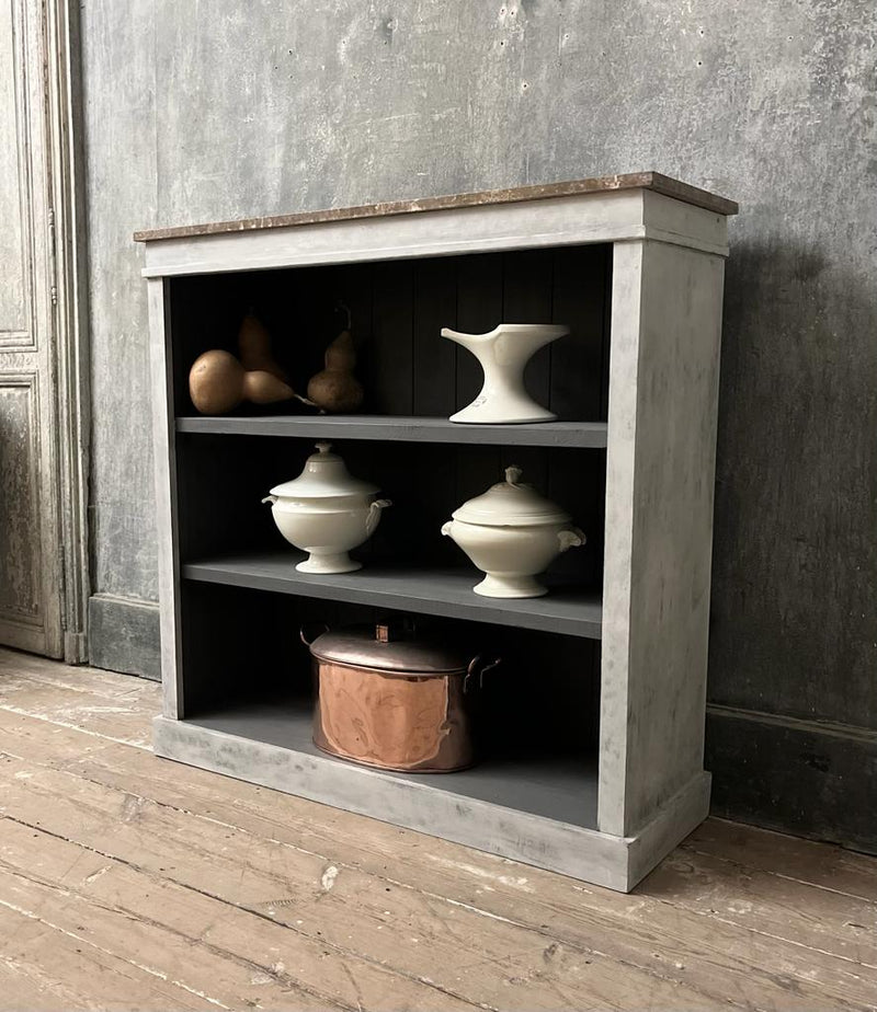 Large bookshelf with marble top