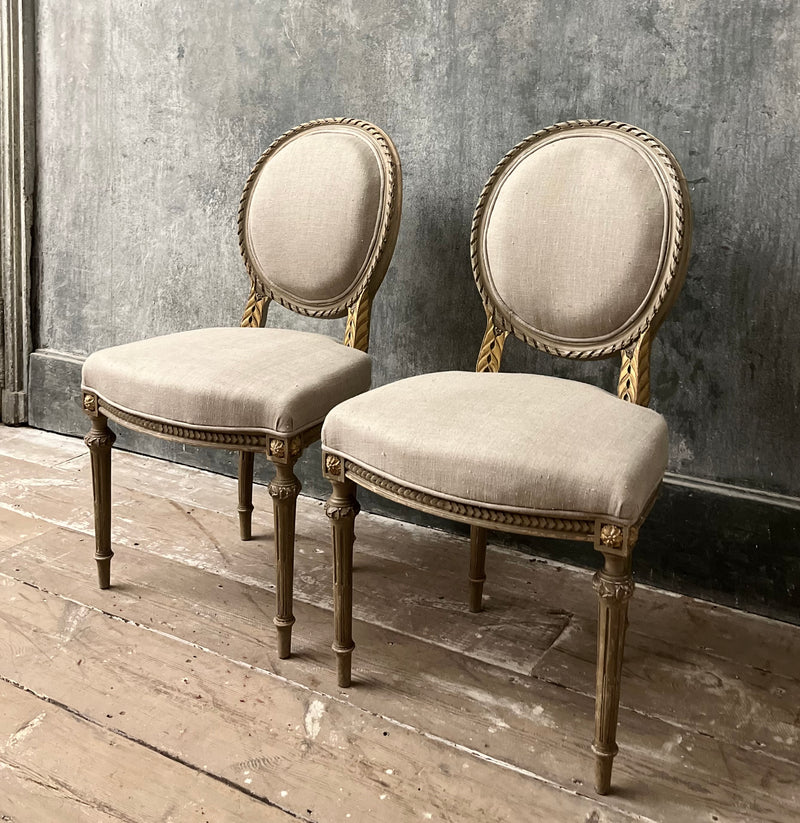 Pair of Louis XVI medallion back chairs